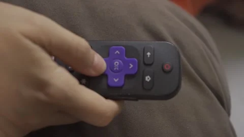 Holding the remote control. Stock Footage 248193158