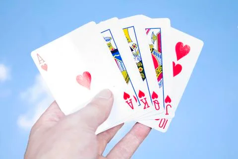 Holding royal flush Stock Photos