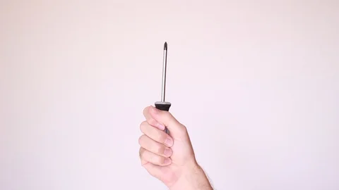 Holding screwdriver overhead 動画素材 95031631