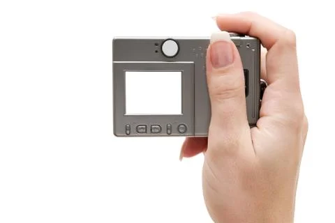 Holding a Small Digital Camera Isolated on a White Background Foto stock