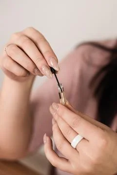 Holding a small perfume sample in your hands Stock Photos