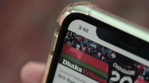 Holding smart phone using facebook, Stock Footage 154901205