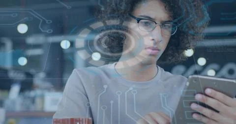 Holding smartphone and typing code in coworking space, with coffee mug and Stock Photos