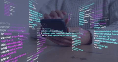 Holding smartphone with hands in gray sweater at light wood home desk, with Stock Photos
