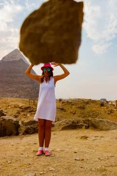 Holding a stone in Cairo, Egypt Stock Photos