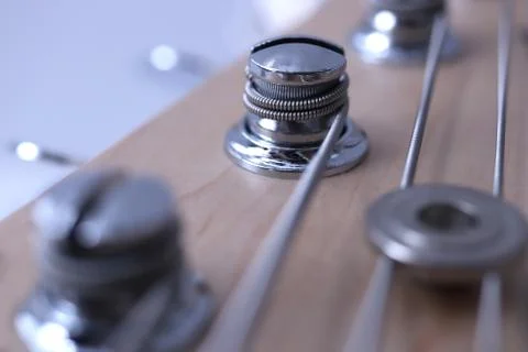 Holding string guitar tuning keys macro closeup. Music instruments background Foto stock