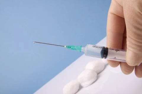 Holding Syringe Foto stock