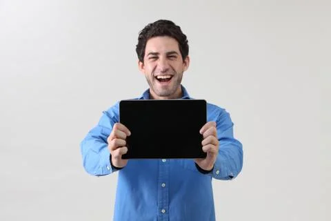 Holding tablet Stock Photos