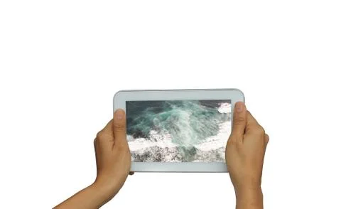 Holding tablet with picture from sea vacation, isolated Stock Photos