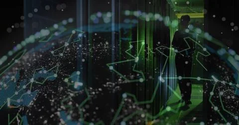 Holding tablet tech dark-clad scanning holographic globe by rack LEDs in server Stock Photos