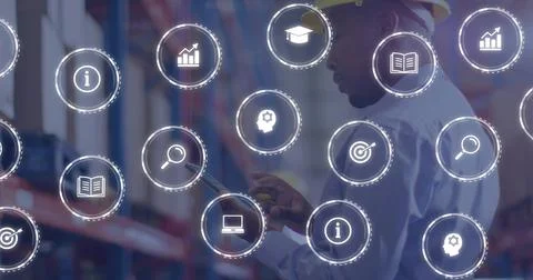 Holding tablet, warehouse tech checking racks with digital icons, yellow hard Stock Photos