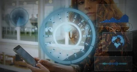 Holding tablet, woman in patterned jacket using holographic interface in office Stock Photos