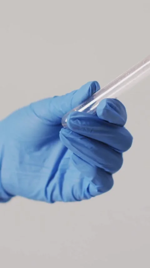 Holding test tube, gloved hand with scientific data analysis animation Stock Footage 319977055