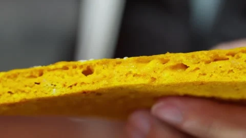 Holding Tibetan Barley Flatbread — Close-Up of Texture and Breakfast Ritual Stock Footage 312584053