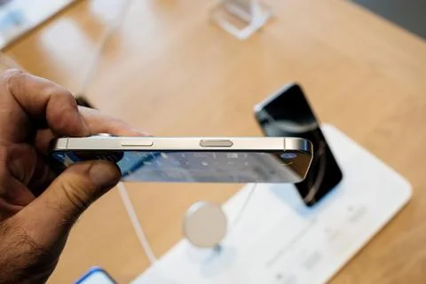 Holding Titanium iPhone 16 Pro with Camera Control Stock Photos