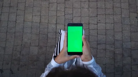 Holding Touchscreen Device, Close-up of female hands using a smart phone Stock Footage 79218495
