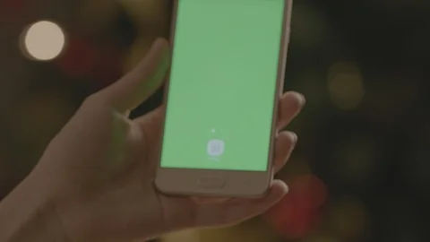 Holding Touchscreen Device, Close-up of female hands using a smart phone. Stock Footage 86488810