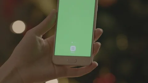 Holding Touchscreen Device, Close-up of female hands using a smart phone. Stock Footage 86489982