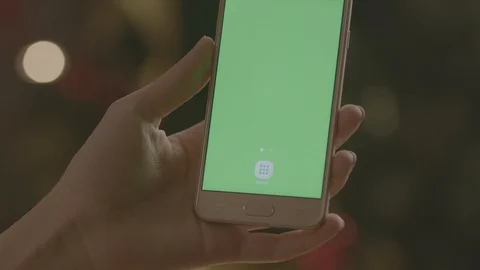 Holding Touchscreen Device, Close-up of female hands using a smart phone. Stock Footage 86491049