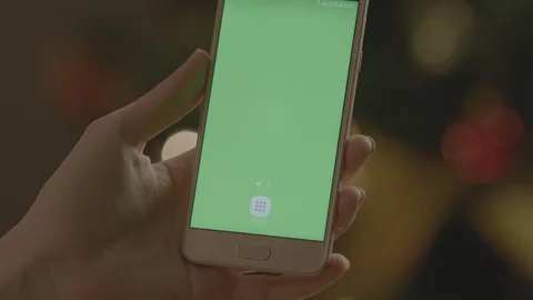 Holding Touchscreen Device, Close-up of female hands using a smart phone. Stock Footage 86492086