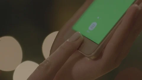 Holding Touchscreen Device, Close-up of female hands using a smart phone. Stock Footage 86492087
