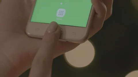 Holding Touchscreen Device, Close-up of female hands using a smart phone. Stock Footage 86492099