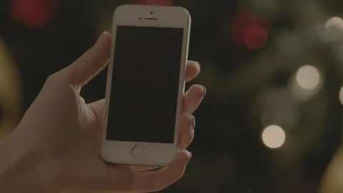 Holding Touchscreen Device, Close-up of female hands using a smart phone. Stock Footage 86493920