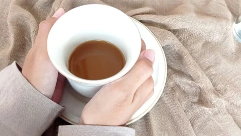 Holding a warm cup of coffee Stock Footage 146250526