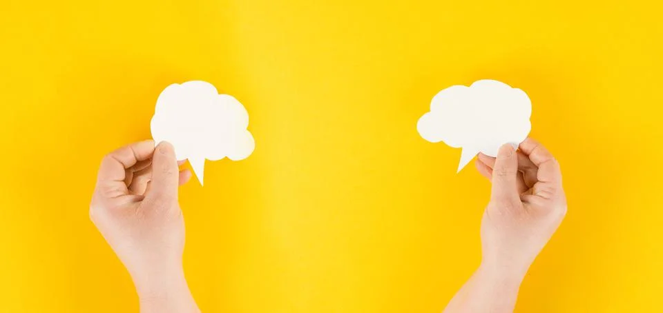 Holding a white cloud in the hand, empty copy space for text, yellow background, Stock Photos