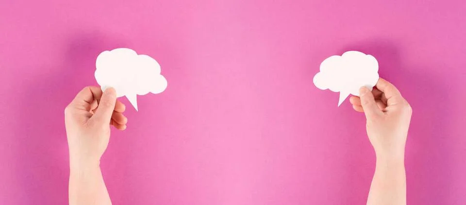 Holding a white cloud in the hand, empty copy space for text, pink backgro... Stock Photos