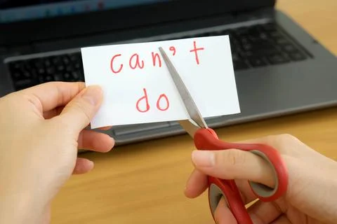 Holds card with text can't do on computer Stock Photos