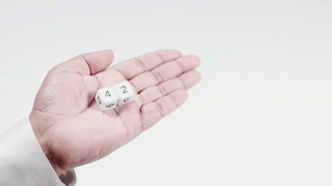 Holds Numbered Dices Four And Two Stock Footage 248742677