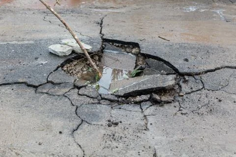 Hole in the asphalt Stock Photos