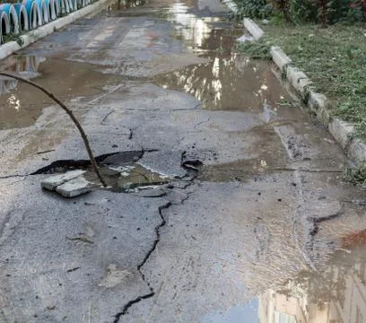Hole in the asphalt Stock Photos