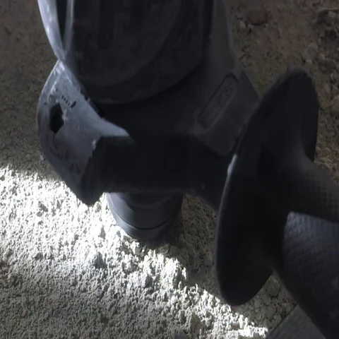 Hole being drilled by drilling machine Stock Footage 69281278