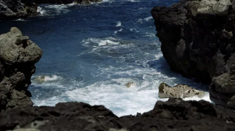 Hole in Black Basalt Cliffs Stock Footage 32153822