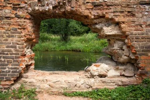 Hole in the brick wall Stock Photos