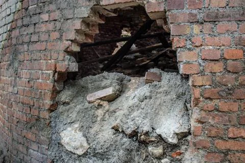 Hole in a brick wall Stock Photos
