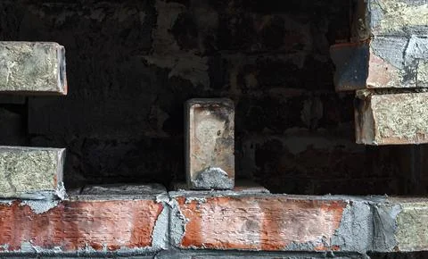 Hole in brick wall Stock Photos