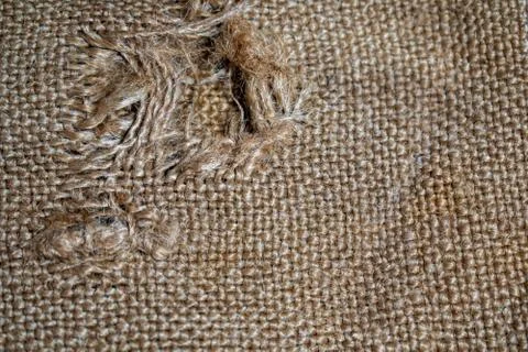 Hole in the burlap for the background 2 Stock Photos