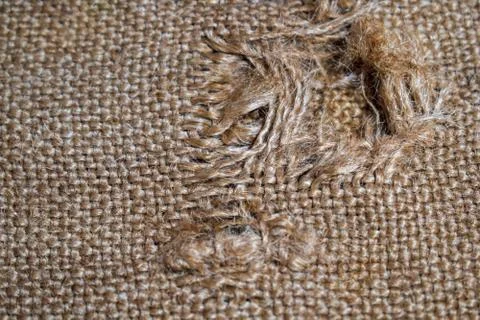 Hole in the burlap for the background Stock Photos