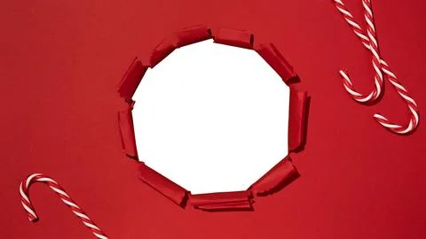 Hole in christmas gift box, empty space for advertising text in torn paper Stock Photos