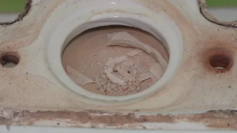 Hole in cistern base with scale residue and old sealant Video stock 327970161
