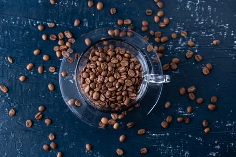 Hole coffee beans in a cup Stock Photos