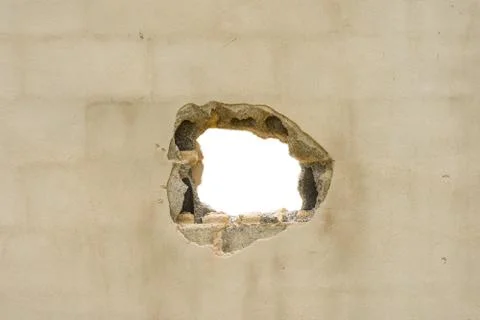 Hole in the concreate wall Stock Photos