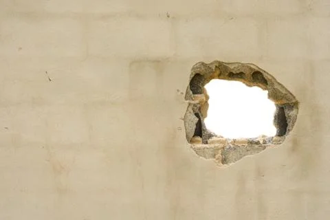 Hole in the concreate wall Stock Photos