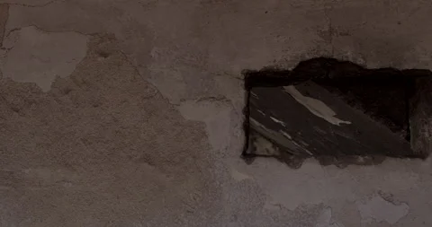 Hole concrete wall. Damage caused combat. Damage to walls buildings war Видео 196940124