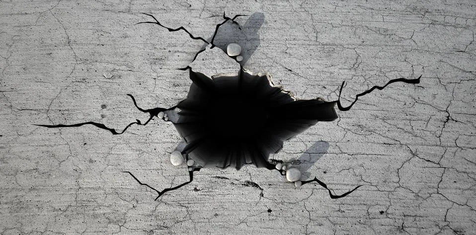 Hole in the cracked ground Stock Illustration