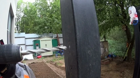 Hole drilling tool at work outdoor video Video stock 87075237