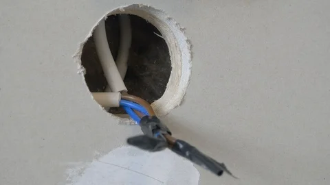 Hole for electrical outlet installation. Stock Footage 107262603
